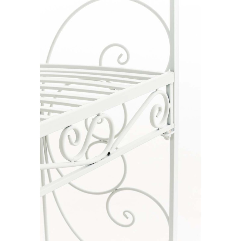 Romanttinen rautainen puolipaviljonki penkillä köynnöskasveille puutarhaan