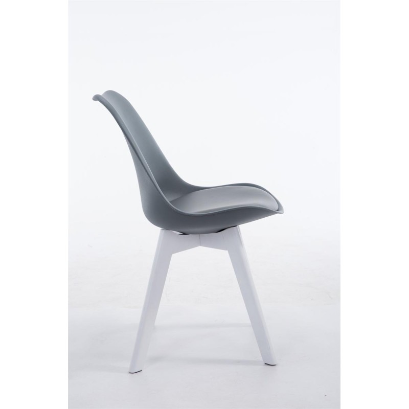 Tyylikäs vierailutuoli keinonahalla ja puisella jalustalla