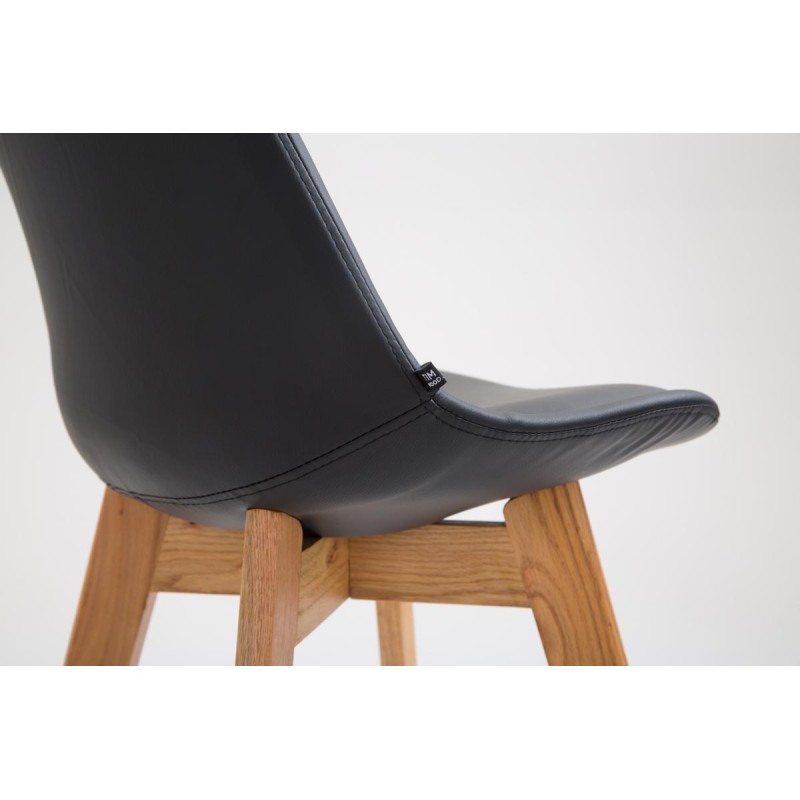 Tyylikäs baarijakkara tammijalustalla ja mukavalla istuimella