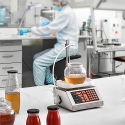 Nestetäyttökone 5–50 g annostelulla peristalttipumpulla digitaalinen ohjaus 201-ruostumatonta terästä yksisuuttiminen