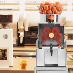 Ammattikäyttöinen automaattinen appelsiinimehupuristin SUS304 ruostumaton teräs PC-suojakansi vesihana 25 appelsiinia minuutissa