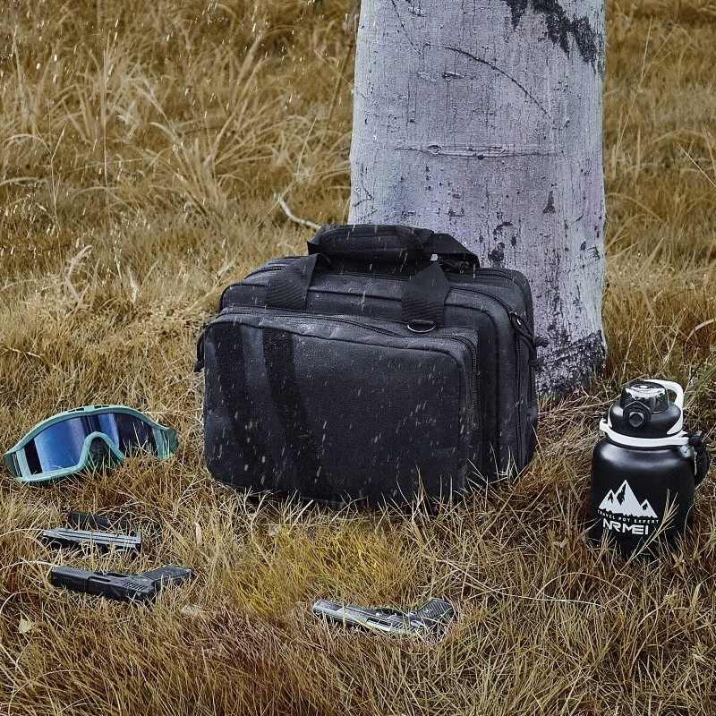 Ampumaradalaukku vesitiivis 600D polyesteri 2 pistoolia 6 irrotettavaa lippasta musta