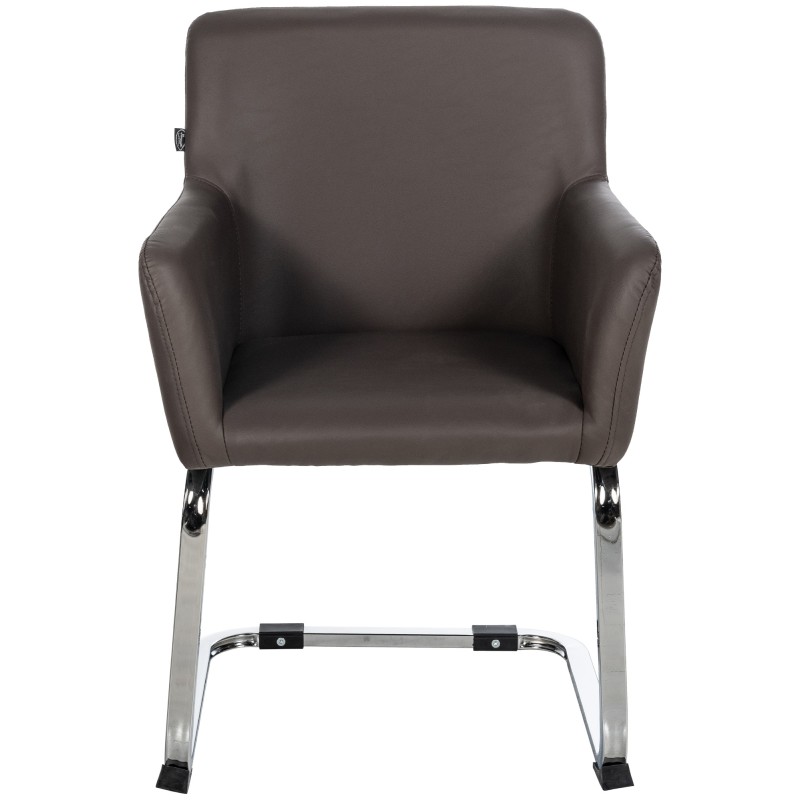 Moderni Puka-keinutuoli pehmustetulla istuimella ja teräsrungolla