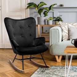 Moderni samettinen keinutuoli pehmustetulla istuimella ja puisilla jalaksilla