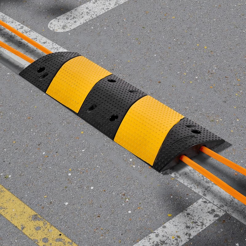 Kuminen hidastetöyssy 1000 mm 2 kaapelikanavaa 2 kpl musta keltainen