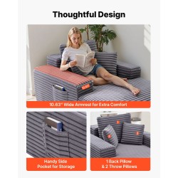 Lepotuoli tilava harmaa keinoturkisverhoilulla jousituksella ja heittotyynyillä