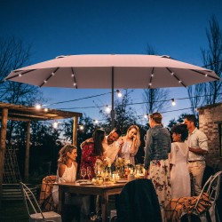 Khakinvärinen ovaali terassi- ja puutarhavarjo LED-valoilla 440 x 260 cm