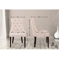 Tyylikäs pehmustettu ruokapöydän tuoli kankaalla ja koristeompeleilla