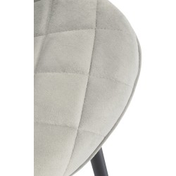 Samettinen moderni tuoli metallijalustalla nykyaikaiseen kotiin