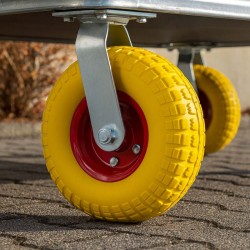 Kääntyvä kuljetusrulla Ø258 mm, 150 kg, puhkeamaton PU-rengas, keltainen