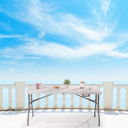 Valkoinen taittopöytä ulkokäyttöön, kompakti ja helposti kuljetettava