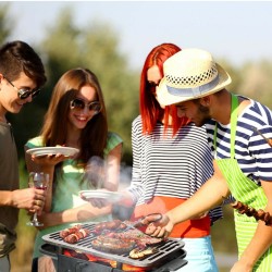 Kannettava valurautainen hiiligrilli kaksipuolisella grillausverkolla