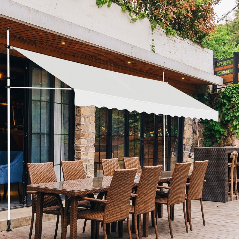 Sisäänvedettävä käsikammella varustettu beige markiisi