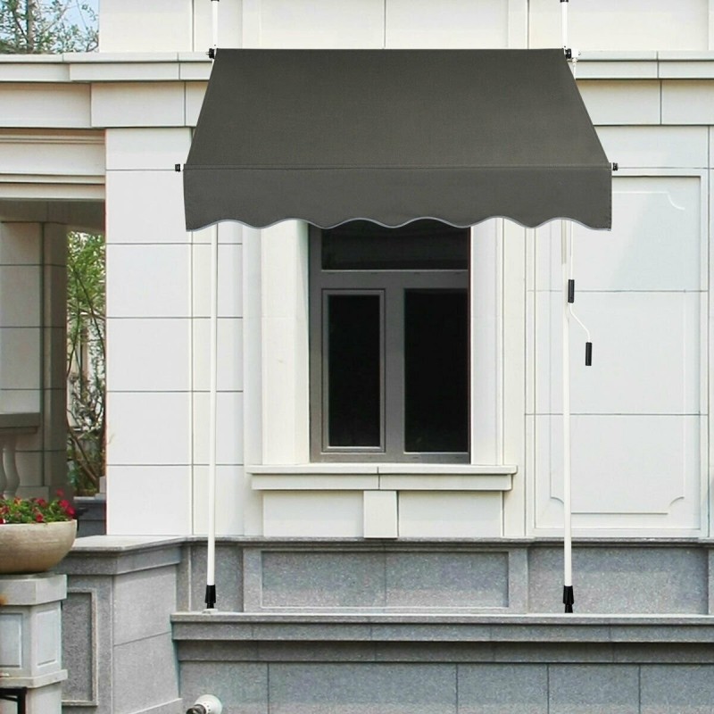 Ulosvedettävä harmaa markiisi säädettävällä korkeudella ja kampimekanismilla