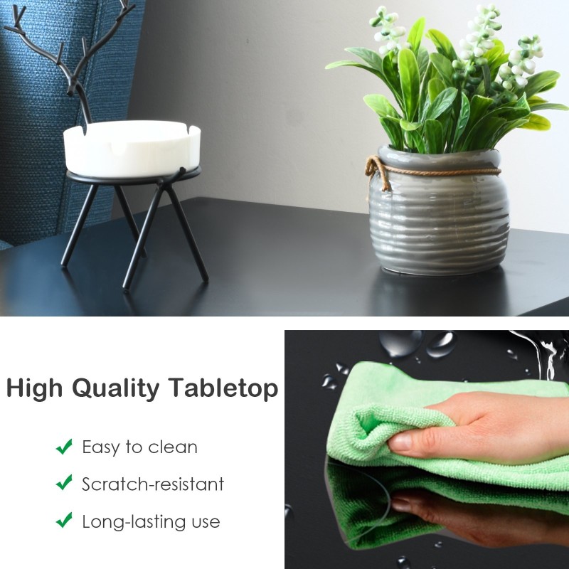 Kolmitasoinen musta yöpöytä olohuoneeseen ja makuuhuoneeseen