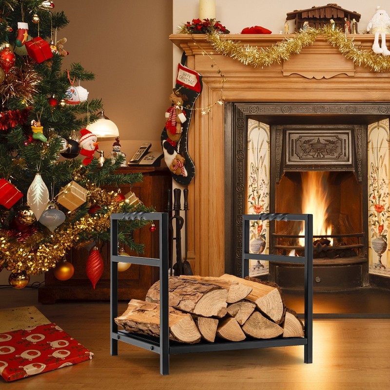 Musta teräksinen halkoteline kiinteällä pohjalla ja kahvoilla