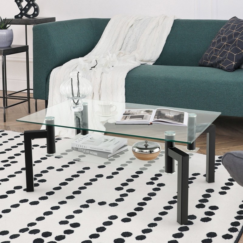 Kaksitasoinen musta lasinen sohvapöytä metallijaloilla Kaksitasoinen musta lasinen sohvapöytä metallijaloilla