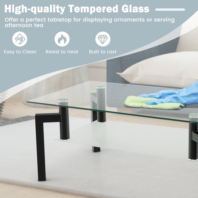 Kaksitasoinen musta lasinen sohvapöytä metallijaloilla Kaksitasoinen musta lasinen sohvapöytä metallijaloilla