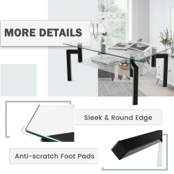 Kaksitasoinen musta lasinen sohvapöytä metallijaloilla Kaksitasoinen musta lasinen sohvapöytä metallijaloilla