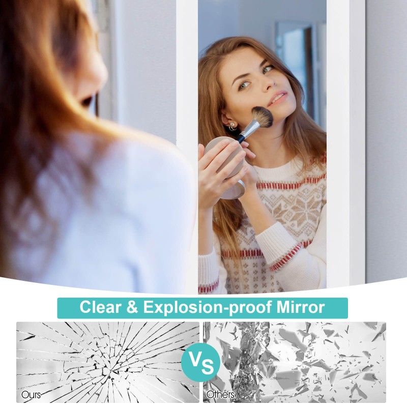 Seinälle asennettava valkoinen korukaappi peilillä ja hyllyillä