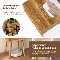 Puinen yöpöytä kahdella laatikolla ja kumipuisilla jaloilla