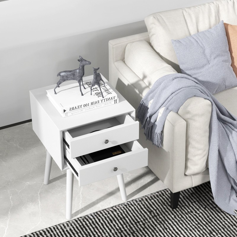 Valkoinen puinen yöpöytä kahdella laatikolla ja kumipuujaloilla