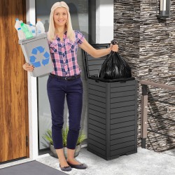 Suuri musta ulkoroskakori nestelokerolla ja kannella