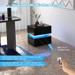 Musta yöpöytä LED-valoilla ja kahdella laatikolla