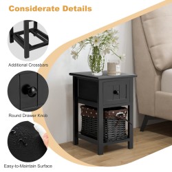 Kaksikerroksinen musta yöpöytä laatikolla ja korilla