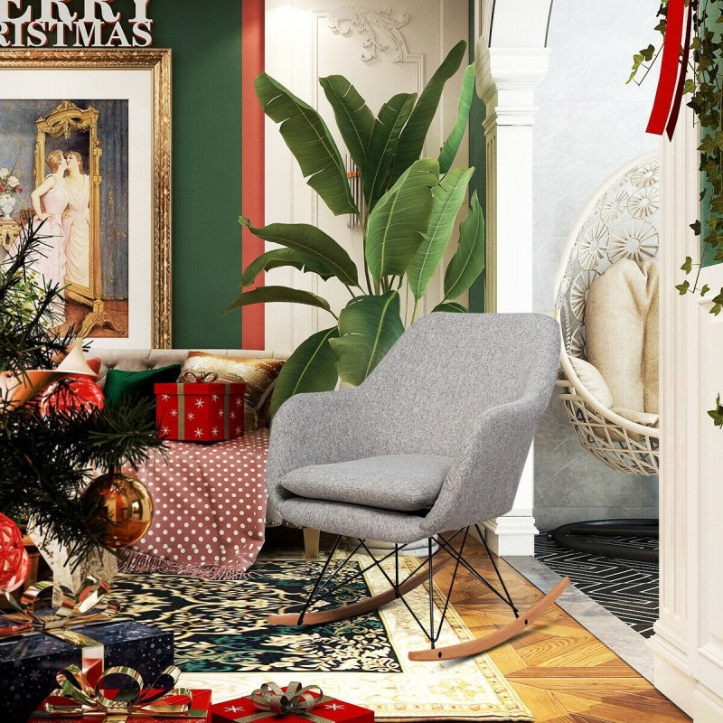 Harmaa ergonominen keinutuoli korkealla selkänojalla ja käsinojilla