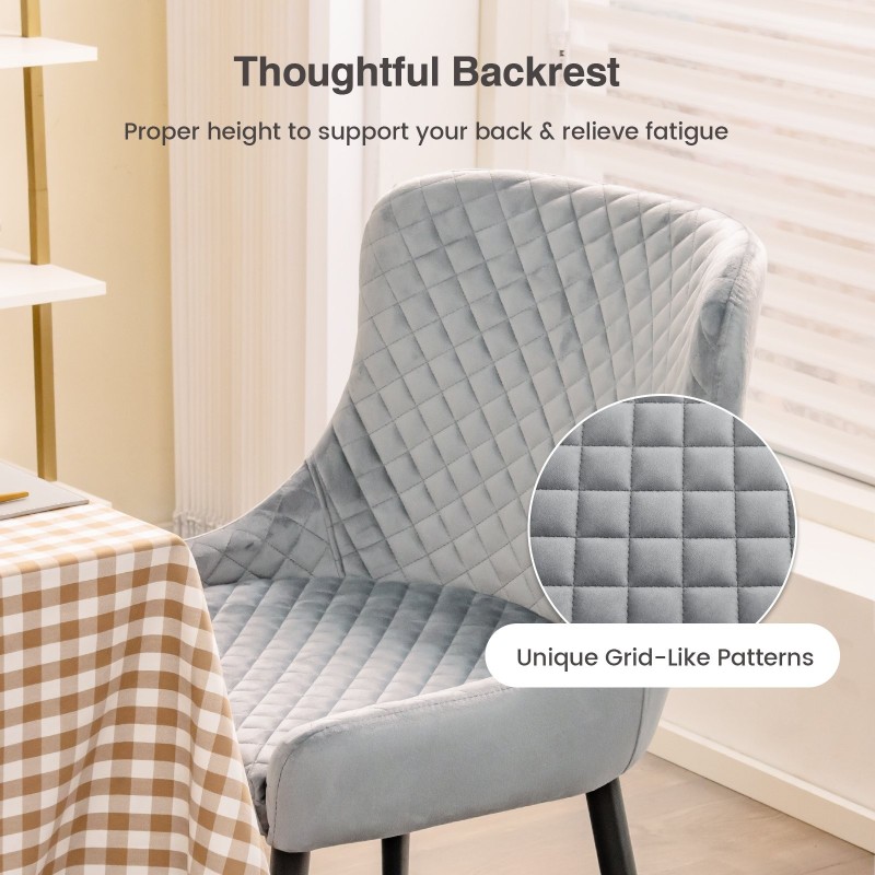 Kaksi harmaata samettituolia säädettävillä jaloilla ruokailutilaan