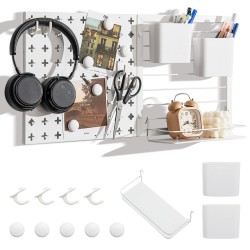 Monikäyttöinen valkoinen pegboard-järjestelmä säilytykseen ja organisointiin Monikäyttöinen valkoinen pegboard-järjestelmä säilytykseen ja organisointiin
