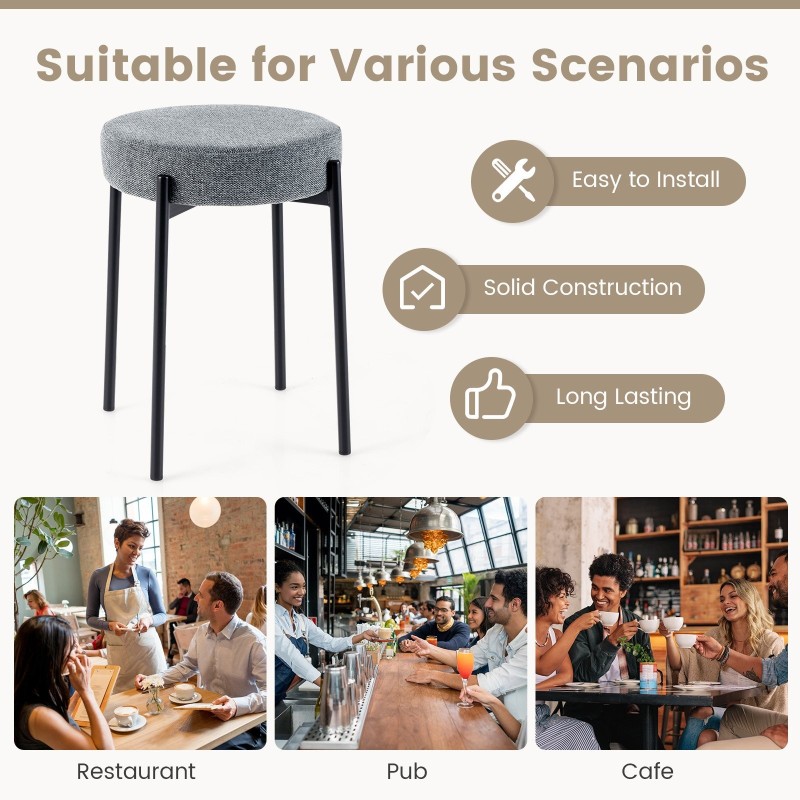 Neljä pinottavaa tummanharmaata keittiötuolia metallijaloilla