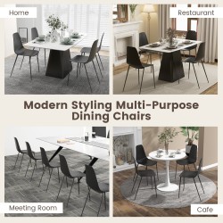 Neljä mustaa metallijalkaista ruokailutuolia ilman käsinojia