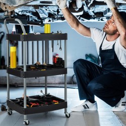 Monikäyttöinen musta työkalukärry pyörillä ja jakajilla