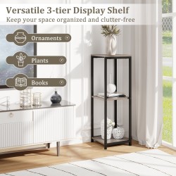 Kolmitasoinen musta metallinen kulmakasviteline kaatumissuojalla