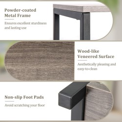 Kolmitasoinen musta metallinen kulmakasviteline kaatumissuojalla