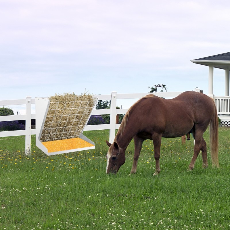 Seinään kiinnitettävä hopeinen heinäteline ja viljasyöttölaite