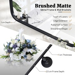 Musta metallikehyksinen kääntyvä suorakulmainen seinäpeili