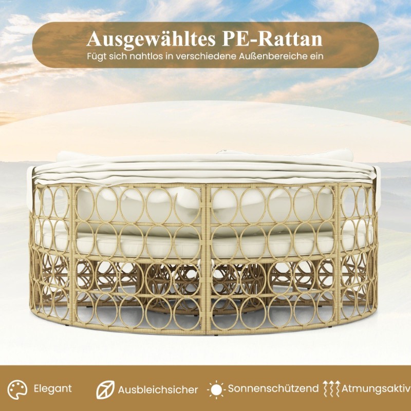 Pyöreä rottinkinen päivänsänky katoksella ja pehmeillä tyynyillä