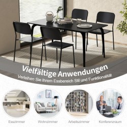 Neljän mustan pinottavan ruokatuolin setti metallijaloilla