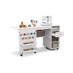 Taitettava valkoinen ompelupöytä säilytyshyllyillä ja tarjottimilla