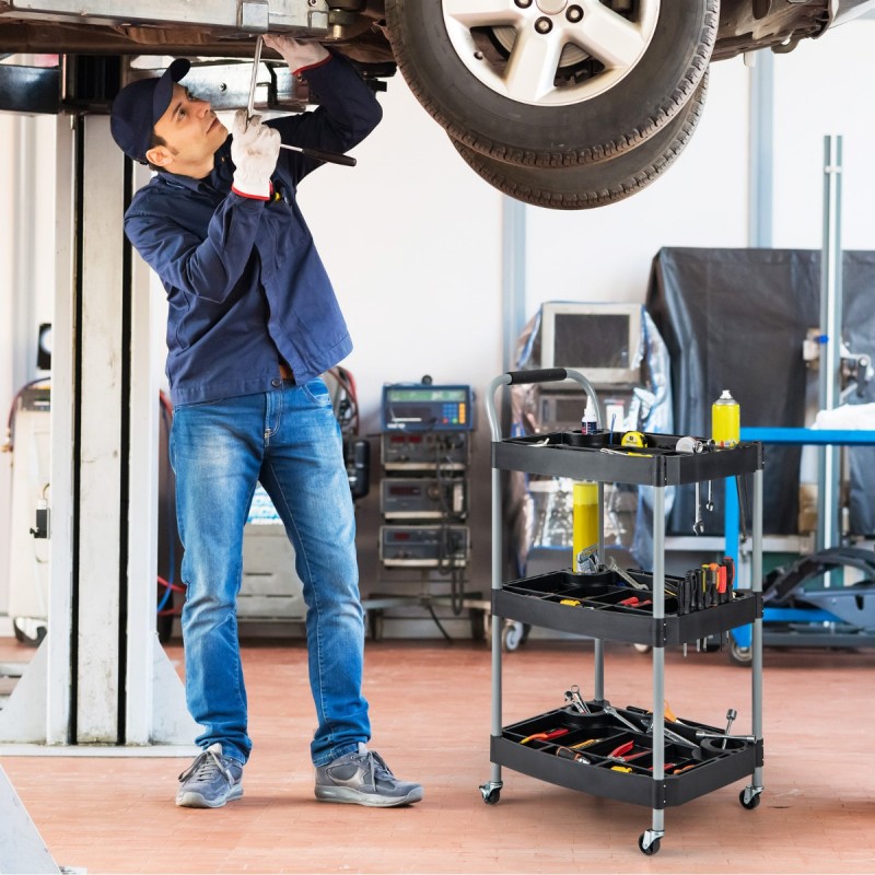 Monikäyttöinen musta työkalukärry pyörillä ja jakajilla