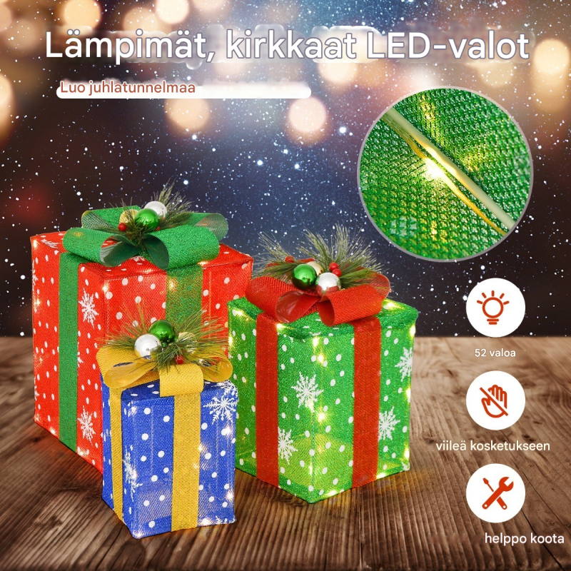 Kolmen setti LED-lahjapakkauksia lämpimillä valoilla