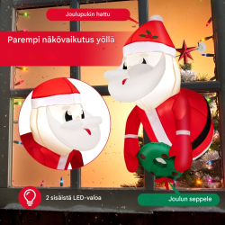 Ikkunasta kurkistava punainen joulupukki LED-valoilla