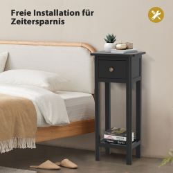 Musta monikäyttöinen lisäpöytä laatikolla ja hyllyllä