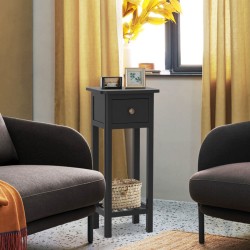 Musta monikäyttöinen lisäpöytä laatikolla ja hyllyllä