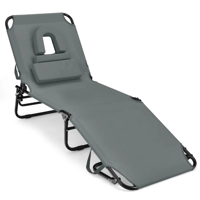 Taitettava harmaa aurinkotuoli kasvotilalla ja säädettävällä selkänojalla