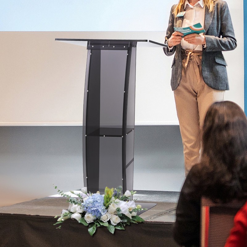 Akryylinen puhujakoroke noin 119 senttimetriä korkea läpinäkyvä leveä pöytätaso säilytyshyllyllä