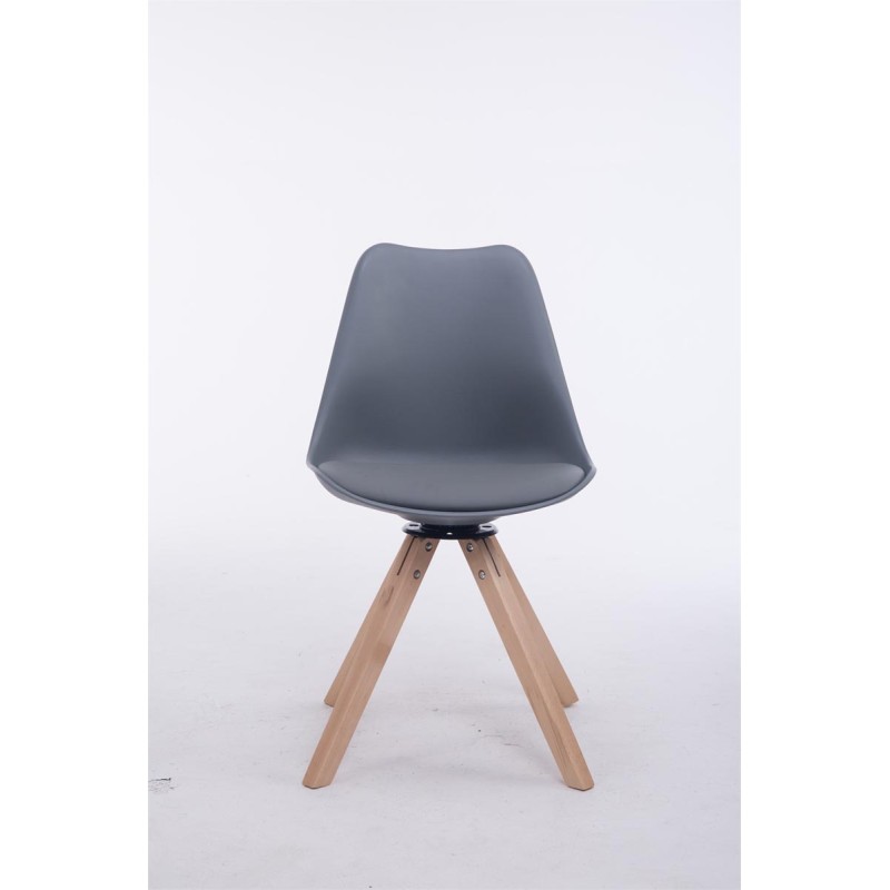 Tyylikäs pyörivä vierailutuoli puisella jalustalla ja keinonahkaistuimella